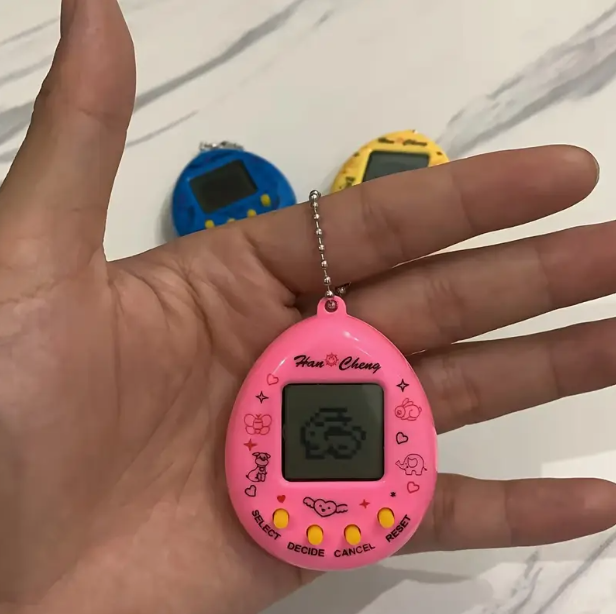 Retro Electronic Virtual Pet Keychain – Classic Handheld Digital Pet Toy